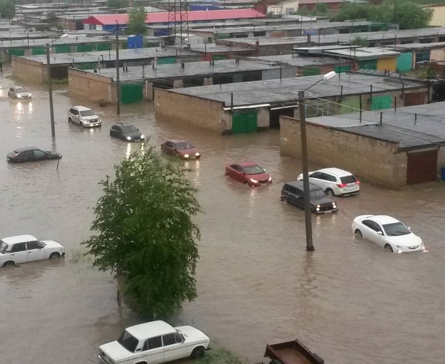 Стихия в Томске и области, Томские новости, Стрежевой ливень подтопило Ливень затопил улицы Стрежевого (ФОТО)